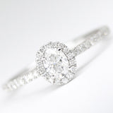 18ct White Gold Oval Diamond .49pts Halo Ring